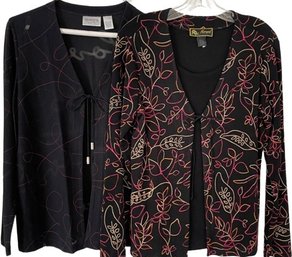 Two Ladies Blouses. Chicos, Size 0. Mirasol, Size Medium. Rayon. Acetate. Polyester. Both Tops Are Black.