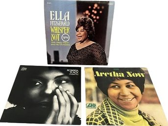 Three Vinyl Records: Roberta Flack, Aretha Franklin And Ella Fitzgerald.
