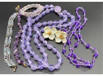 Lovely Purple Jewelry Collection, Including Two Beaded Necklaces, Three Bracelets, And Pair Of Earrings