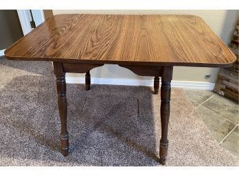 Wooden Table With Leaf Extenders On Each Side!