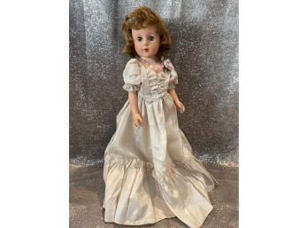 Tall Red Headed Doll With A Long Silver Gown. Good Condition.