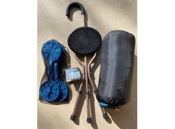 Outdoor Recreational Items Including A Sleeping Bag, Unopened Water Fan Paddles And A Stool/cane.