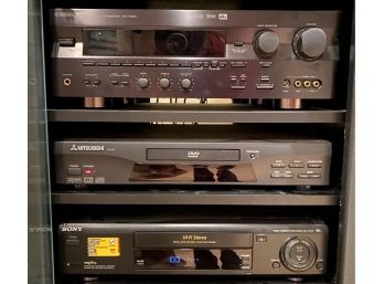 Yamaha AV Receiver, Mitsubishi DVD Player W/ Remote, And Sony VHS Player