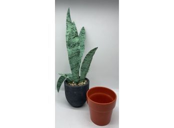 Lovely Artificial Snake Plant And Orange Ceramic Pot.