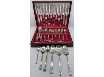 WM Rogers IS Silverware Set. Complete With Forks, Spoons, And Knives