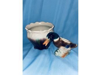 Beautiful Ceramic Vase With Various Colors And A Small Decorative Duck