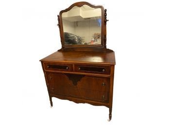 Antique Wooden Dresser With Swivel Mirror Attached