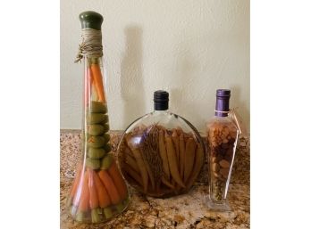 3 Italian Oil Bottles With Contents Inside. Various Sizes