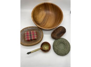 Intricate Stone Ashtray, Wooden Bowls, And Decorative Baskets