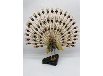 Elegant Metal Peacock Sculpture With Vibrant Colors