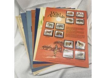 STAMPS: (7) World Of Stamps Series Including Wild Animals And Normal Rockwell