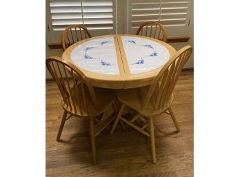 Dining Table And (4) Chairs. Table Has Tile Top With Blue Floral Design. No Leafs