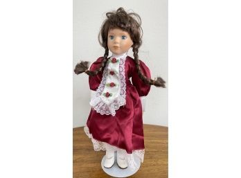 Lovely Porcelain Collectible Doll. Adorable  Braids And A Red Dress