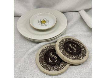 Various Home Essentials: Two S Coasters, Daisy Trinket Holder, And (3) White Dessert Plates By Oneida