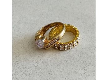 Gold Color Rings With Beautiful Diamond Accents. One Made In China, The Other With Elastic Band