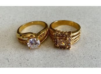 (2) STUNNING Gold Color Rings With Unauthentic Diamonds. No Markings On Either Ring
