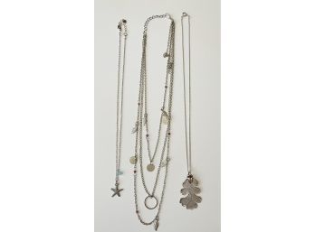 Adorable Collection Of Necklaces (3). Starfish, Leaf, And Multi Charm Necklaces.
