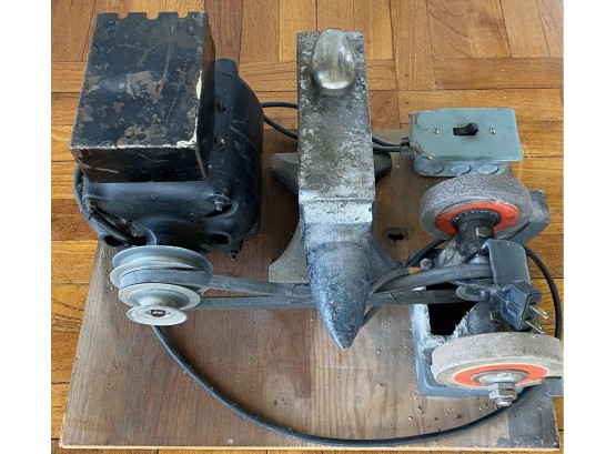 28 Pound Anvil On Wooden Board With Other Tools