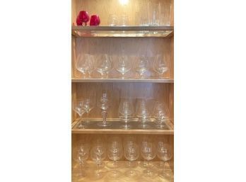 Cabinet Of Glassware: Brandy Glasses, Ribbed Highball Glasses, Wine Glasses And More