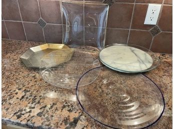 Assortment Of Glass Serving Plates And A Marble Stand, Made In Italy