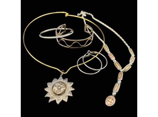 (2) Necklaces, Bracelets, And Pair Of Earrings. Includes Necklace With Sun Face Pendant