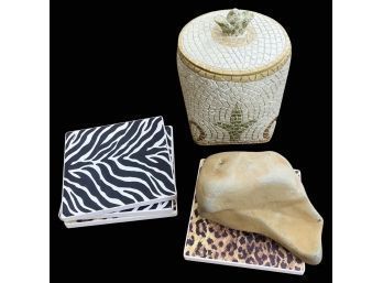 Small Collection Of Various Accent Pieces: Animal Print Coasters, Jar, And Unique Rock