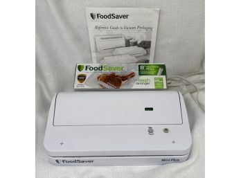 FoodSaver Mini Plus Vacuum Packaging With Box Of Heat Seal Rolls