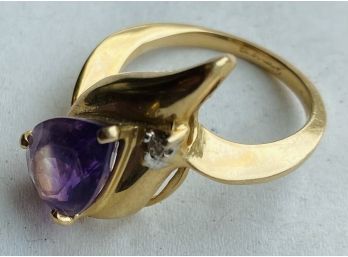 Unique Ring With Engraving On Inside And Purple Stone