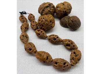 Unique Hand Carved Walnuts With Intricate Chinese Details. Comes In Quaker Oat Can