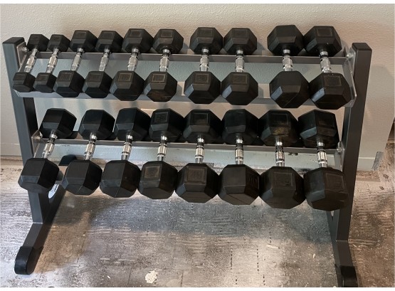 Rubber Dumbbell Set With Rack By Hoist. Ranges From Weights 5 To 50