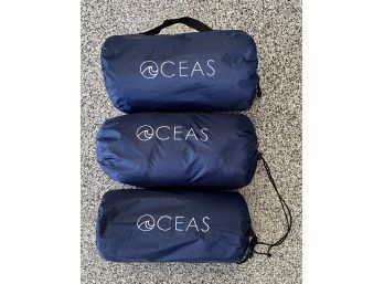 (3) OCEAS Waterproof Blankets In Bags
