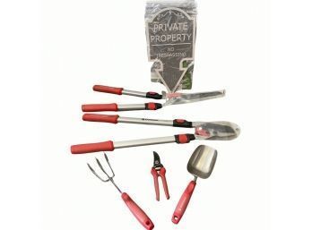 Corona Yard Tools With Comfort Gel Handles And A Private Property Yard Sign