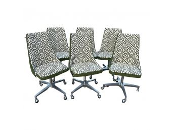 Funky Green Dining Chairs With Geometric Designs. On Wheels!