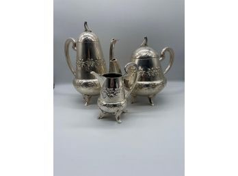 (3) Silver Style Tea Pot Set With Floral Design'H:10.5 L: 8 H: 9 L: 9 H: 6.5 L: 5.5'