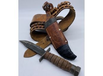 Hunting Knife In Sheath Attached To Leather Belt