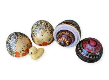 A Pair Of Hand Painted Wooden Nesting Eggs