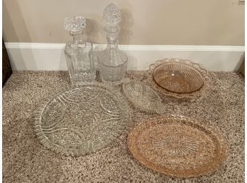 Beautiful Glass Decanters, Plates And Bowls. Two Are Pink Glass