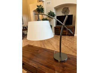Sleek Adjustable Metal Table Lamp With White Lampshade