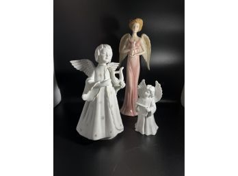 Angel Figurine Collection, One Angel Is Musical To The Tune Of Silent Night