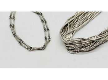 Two Stunning Silver Tone Necklaces. One Is 27'