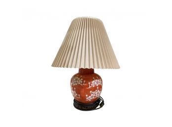 Orange And White Floral Designed Porcelain Lamp On Wood Base