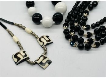 Make A Fashion Statement In Black-and-white. Beads And Silver Accent Necklaces