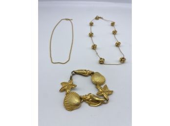 Lovely Gold Colored Necklaces And Shell Designed Bracelet