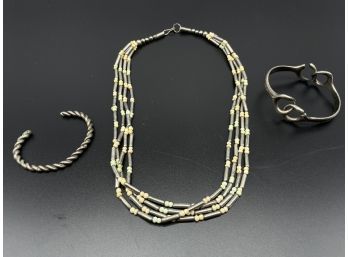 Two Unique Silver Toned Metal Bracelets And Necklace