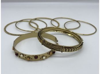 Beautiful Assortment Of Gold Colored Bangles