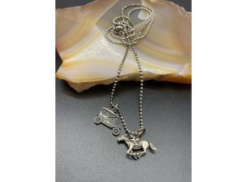 .925 Necklace Chain And Two Sterling Silver Charms, Including Buggy And Race Car.