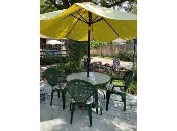 Metal Patio Table With Yellow Umbrella And Plastic Chairs With Floral Cushions Set