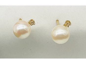 10 K Pearl And Diamond Pierced Earrings. Total Weight .76 G