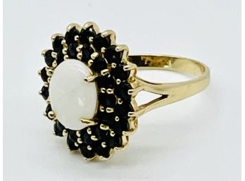 14 K Gold Ring With Black And White Gemstones. Weighs 4.15 G