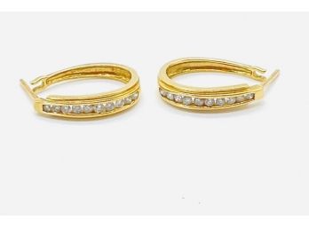 14 K Gold Pierced Earrings With Diamonds. Total Weight 4.07 G